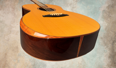 Andy Powers acoustic guitar with koa bevel and end graft