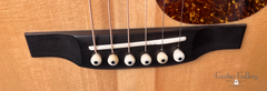Bourgeois Luthier's Choice Flame Maple guitar bridge