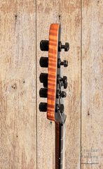 Ernie Ball Music Man Kaizen 7 String Guitar side of headstock