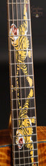 Leach guitar with tiger fretboard inlays