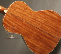 Square Deal guitar beeswing mahogany back