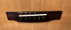Cumpiano Sycamore OM guitar bridge