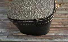 Cumpiano Sycamore OM guitar case edge