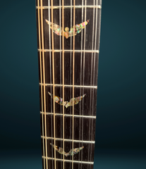 Langejans 12 string guitar abalone wing inlays on the ebony fretboard