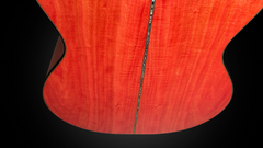 Olson Pink Ivory guitar with abalone back strip