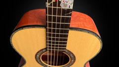 Olson Pink Ivory guitar with abalone top trim