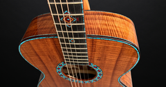 Osthoff OM Krazy Koa guitar with recon turquoise accents