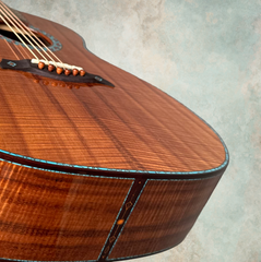 Osthoff OM Krazy Koa guitar end view