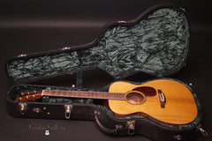 Bourgeois OM guitar inside case