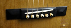 Bourgeois Soloist OMC AT guitar bridge