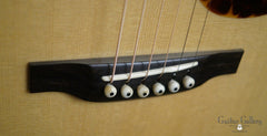 Bourgeois OMS Koa guitar bridge