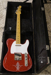 Crook Red Sparkle T-Style Guitar inside case