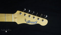 Crook Red Sparkle T-Style Guitar logo