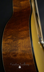 Hewett quilted Mahogany D guitar side close up