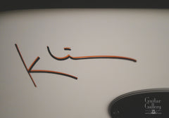 Klein headless electric guitar logo on front