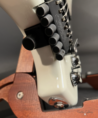 Klein headless white electric guitar end view