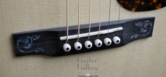 Larrivee LV-10 Koa custom guitar bridge