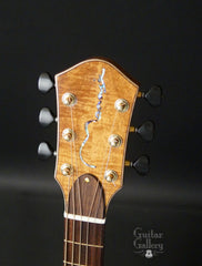 Ben Mannix OM guitar abalone logo