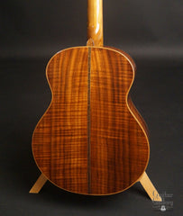 Petros Tunnel 13 guitar curly walnut back