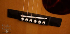 Bourgeois OMC 150 guitar bridge