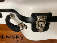 White Martin OM case by Calton cases, leather handle, rubber latch protectors