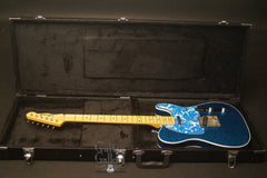 Crook T-style electric guitar inside case