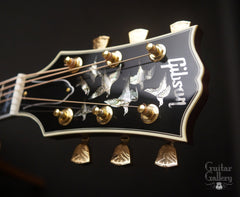 Gibson Doves in Flight guitar headstock with 7 engraved doves