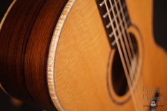 Elysian guitar white curly koa binding