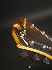 Marchione semi-hollow deluxe archtop builder logo