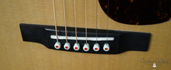 Martin OM-28 Modern Deluxe guitar bridge