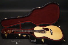Martin OM-28 Modern Deluxe guitar inside case