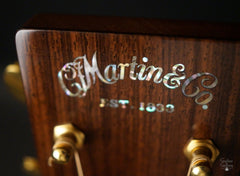 Martin OM-28 Modern Deluxe guitar logo