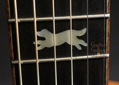 Running Dog guitar logo